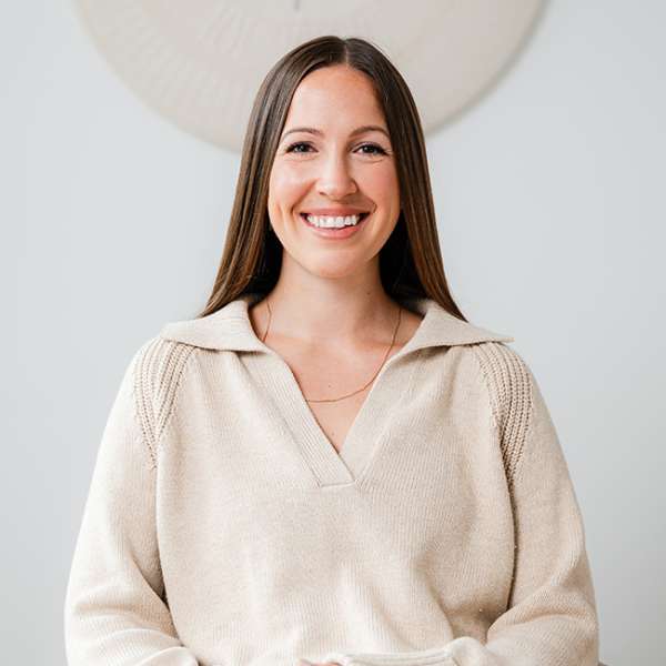 GABRIELLE IWASKOW White seated and smiling