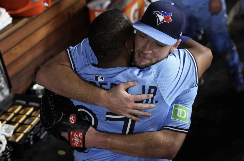 Toronto Blue Jays teammates Vladimir Guerrero Jr. and Trey David Yesavage embrace after World Series game – symbolizing connection, resilience, and performance mindset celebrated by The Design Your Life Centre in Toronto